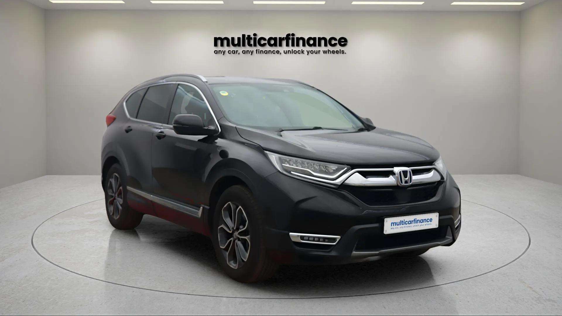 2023 Honda CR-V 2.0 Hybrid available on PCP and HP finance at Multi Car Finance, featuring a sleek black exterior and modern hybrid technology for a smooth driving experience.