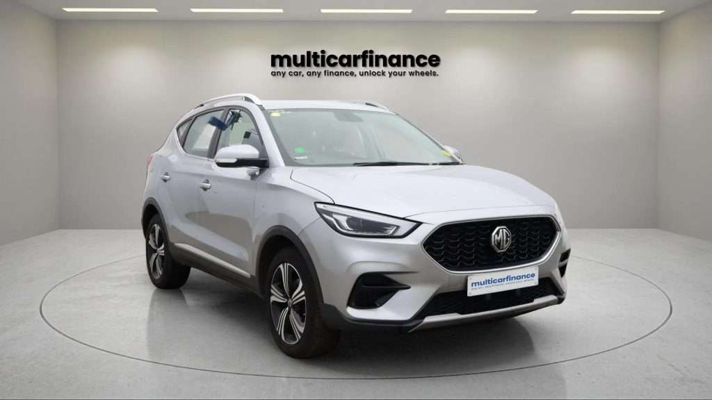 A silver 2022 MG ZS petrol SUV with manual transmission, available on PCP and HP finance at MultiCar Finance, showcasing its sleek design and practical appeal.