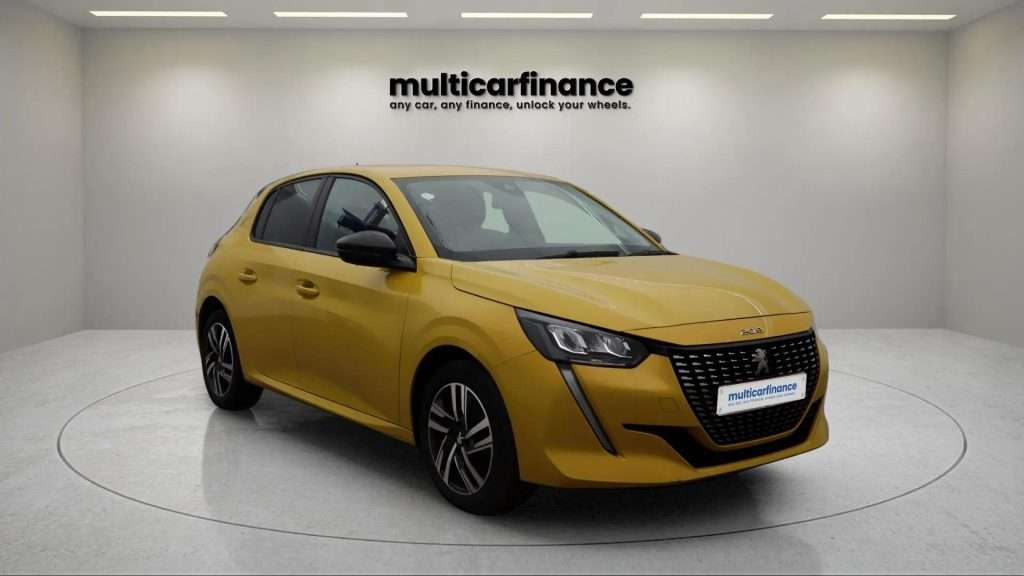 A yellow 2023 Peugeot 208 petrol hatchback with automatic transmission, available on PCP and HP finance at MultiCar Finance, showcasing its vibrant design and urban appeal.