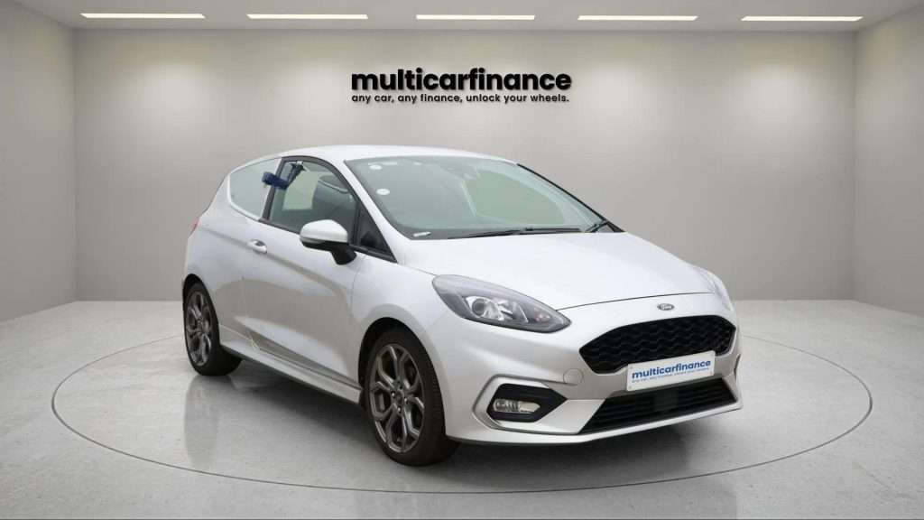 A silver 2021 Ford Fiesta petrol hatchback with manual transmission, available on PCP and HP finance at MultiCar Finance, showcasing its sleek design and urban appeal.
