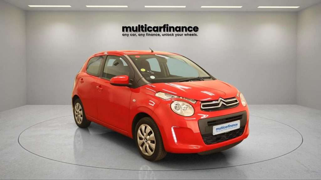 A red 2019 Citroen C1 petrol hatchback with manual transmission, available on PCP and HP finance at MultiCar Finance, showcasing its vibrant design and urban appeal.