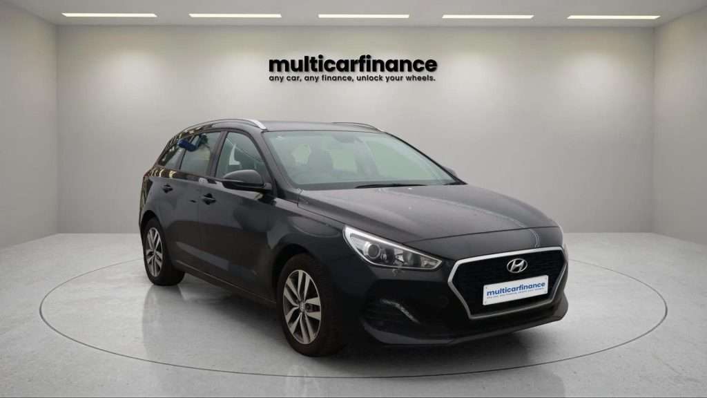 A blue 2020 Hyundai i30 Tourer petrol estate with automatic transmission, available on PCP and HP finance at MultiCar Finance, showcasing its sleek design and practical appeal.