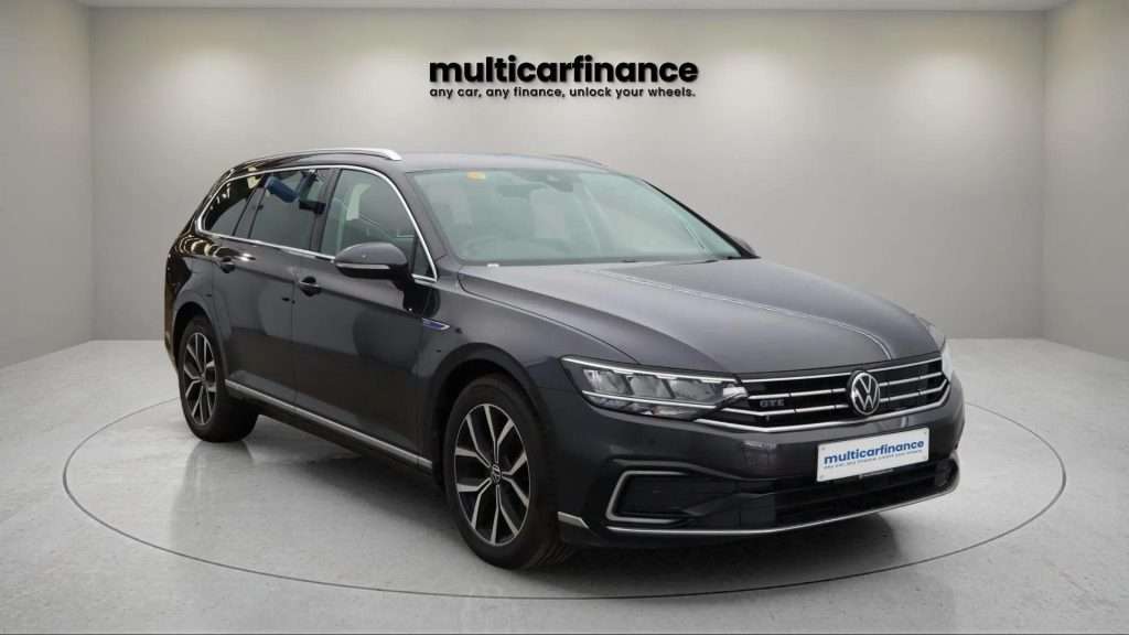 A black 2022 Volkswagen Passat hybrid saloon with automatic transmission, available on PCP and HP finance at MultiCar Finance, showcasing its sleek design and eco-friendly appeal.