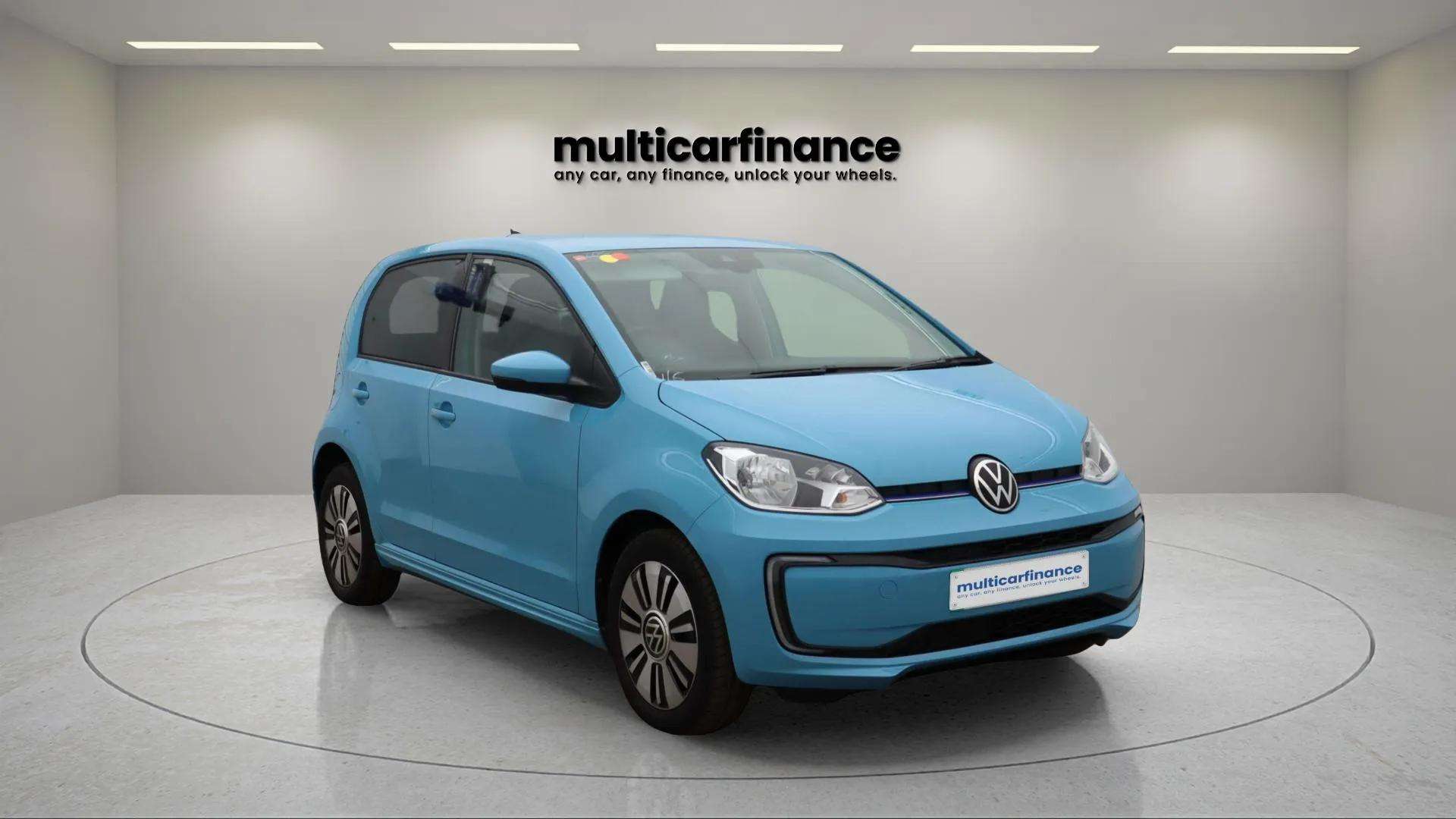 A blue 2022 Volkswagen e-up electric hatchback with automatic transmission, available on PCP and HP finance at MultiCar Finance, showcasing its compact design and eco-friendly appeal.